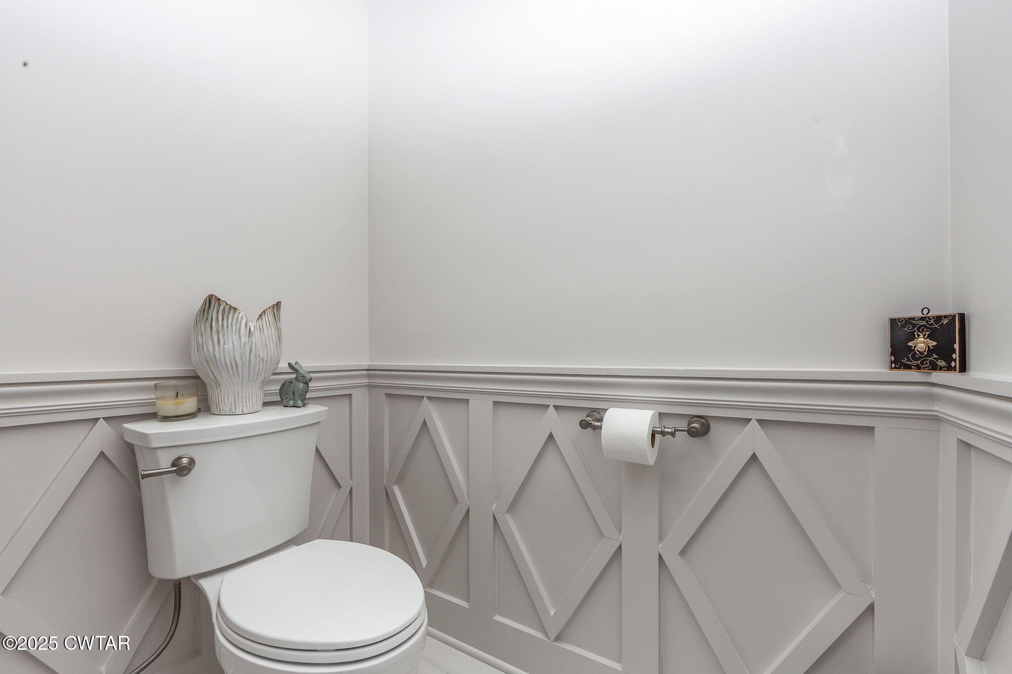 119 Bascom Road Jackson, TN 38305 - Photo 22 of 49 a white toilet sitting next to a shower