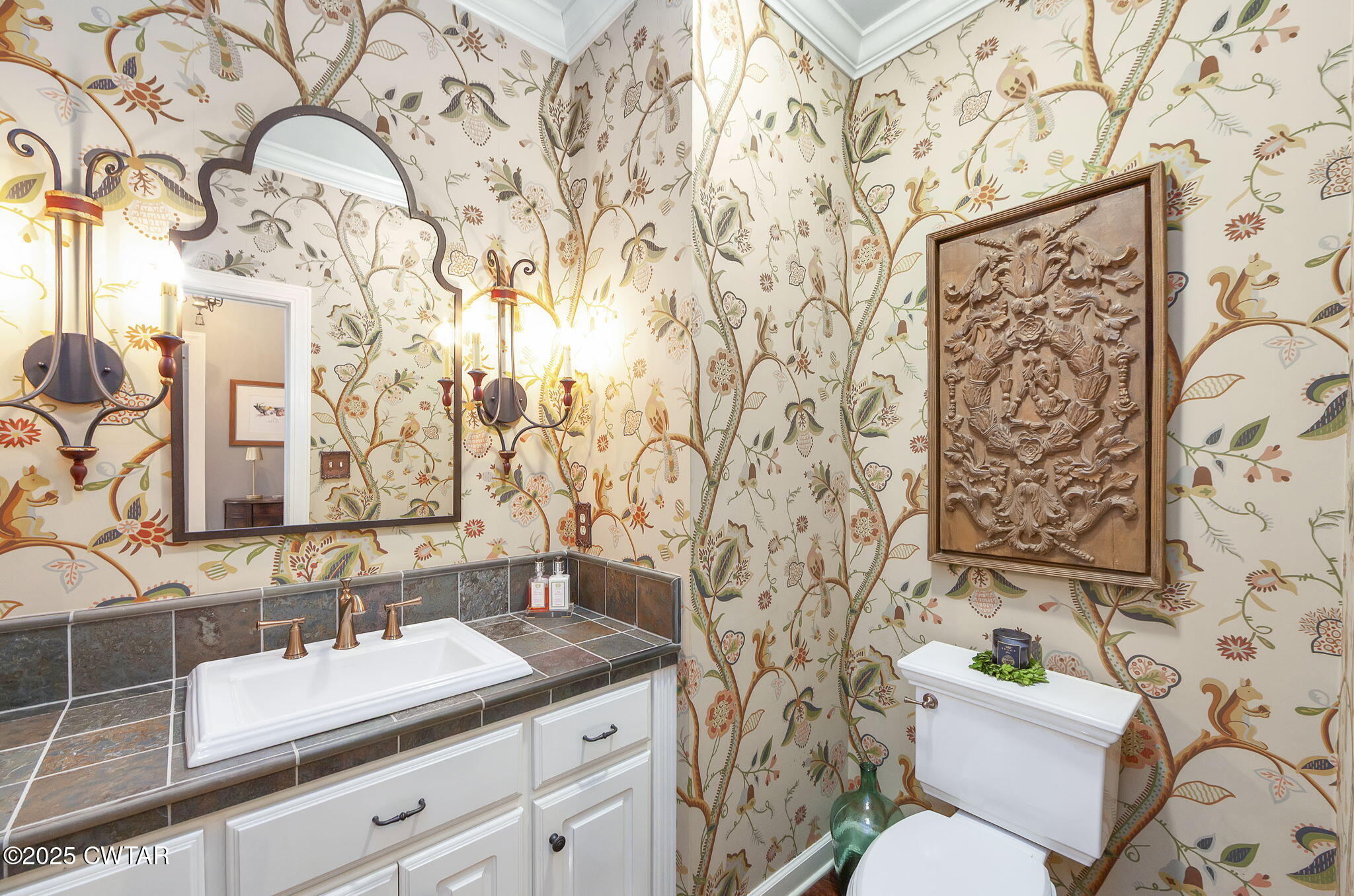 119 Bascom Road Jackson, TN 38305 - Photo 26 of 49 a bathroom with a granite countertop toilet sink and mirror