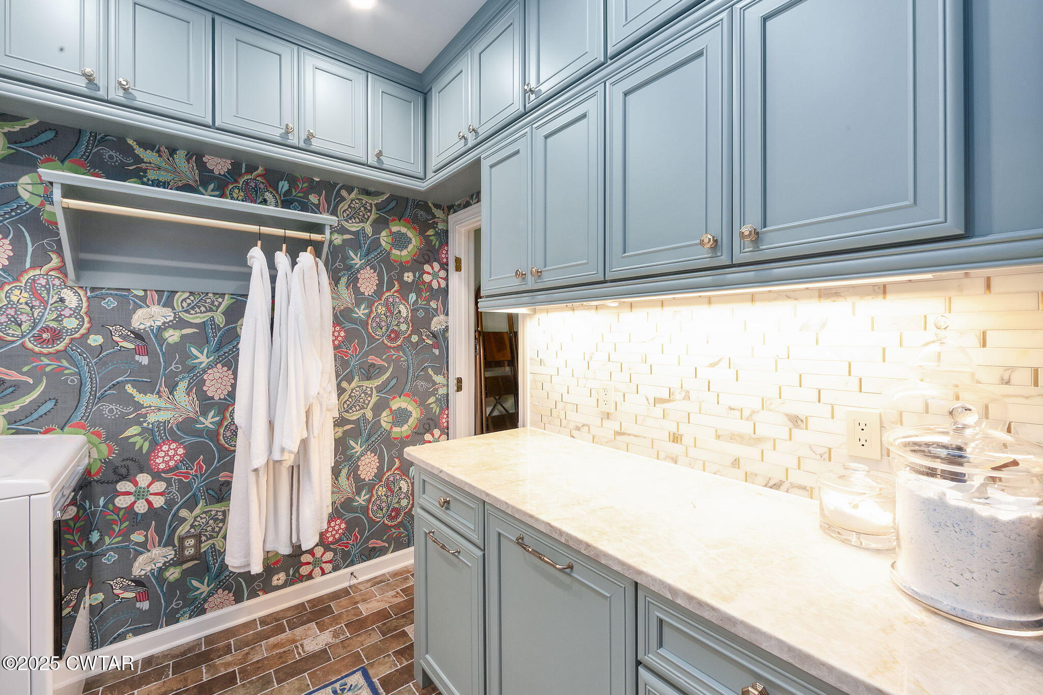 119 Bascom Road Jackson, TN 38305 - Photo 33 of 49 a kitchen with stainless steel appliances granite countertop a sink and cabinets
