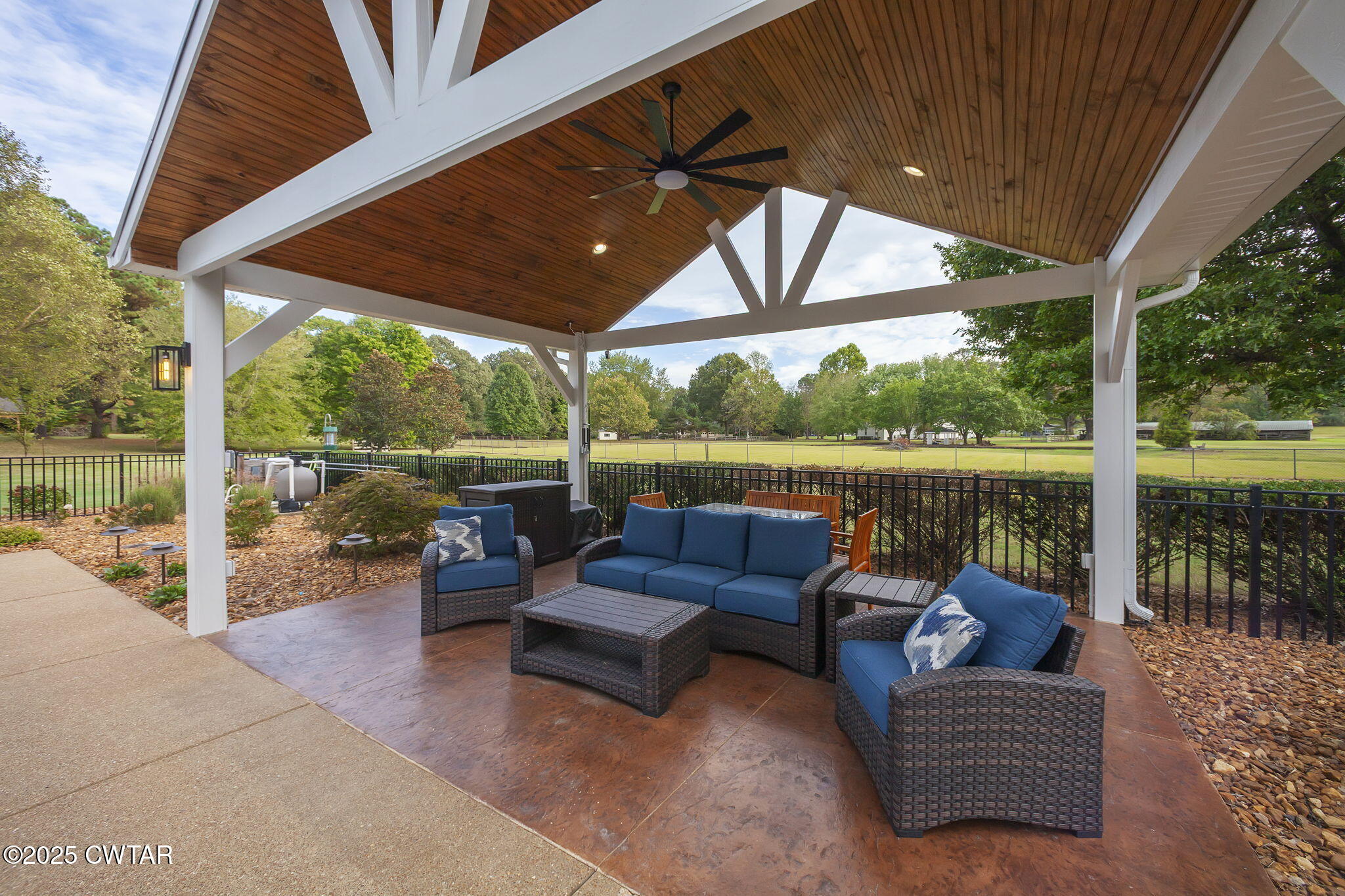 119 Bascom Road Jackson, TN 38305 - Photo 35 of 49 a view of a patio with couches chairs and a potted plant
