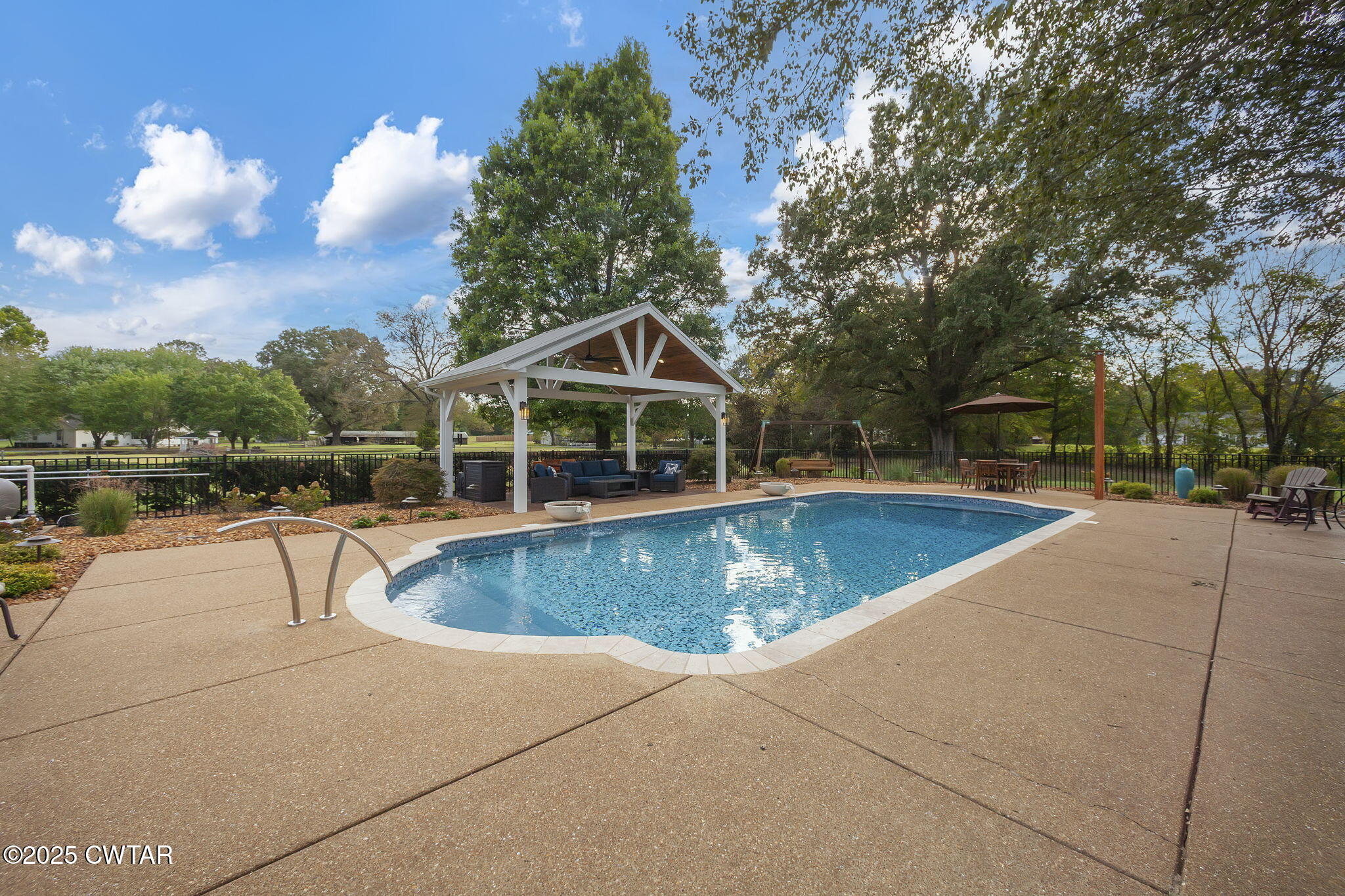119 Bascom Road Jackson, TN 38305 - Photo 36 of 49 a view of a house with pool