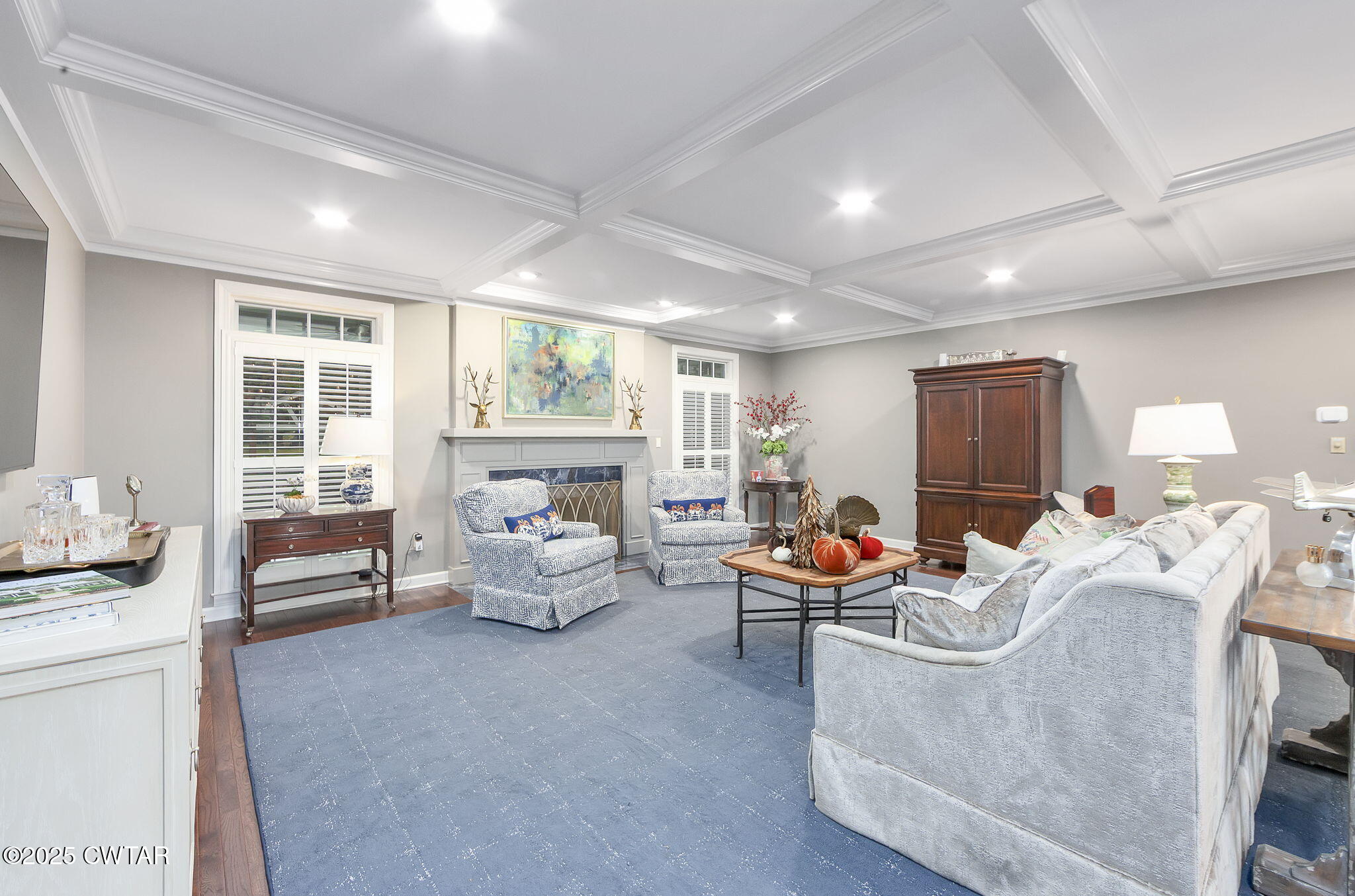 119 Bascom Road Jackson, TN 38305 - Photo 4 of 49 a living room with furniture fireplace and a large window