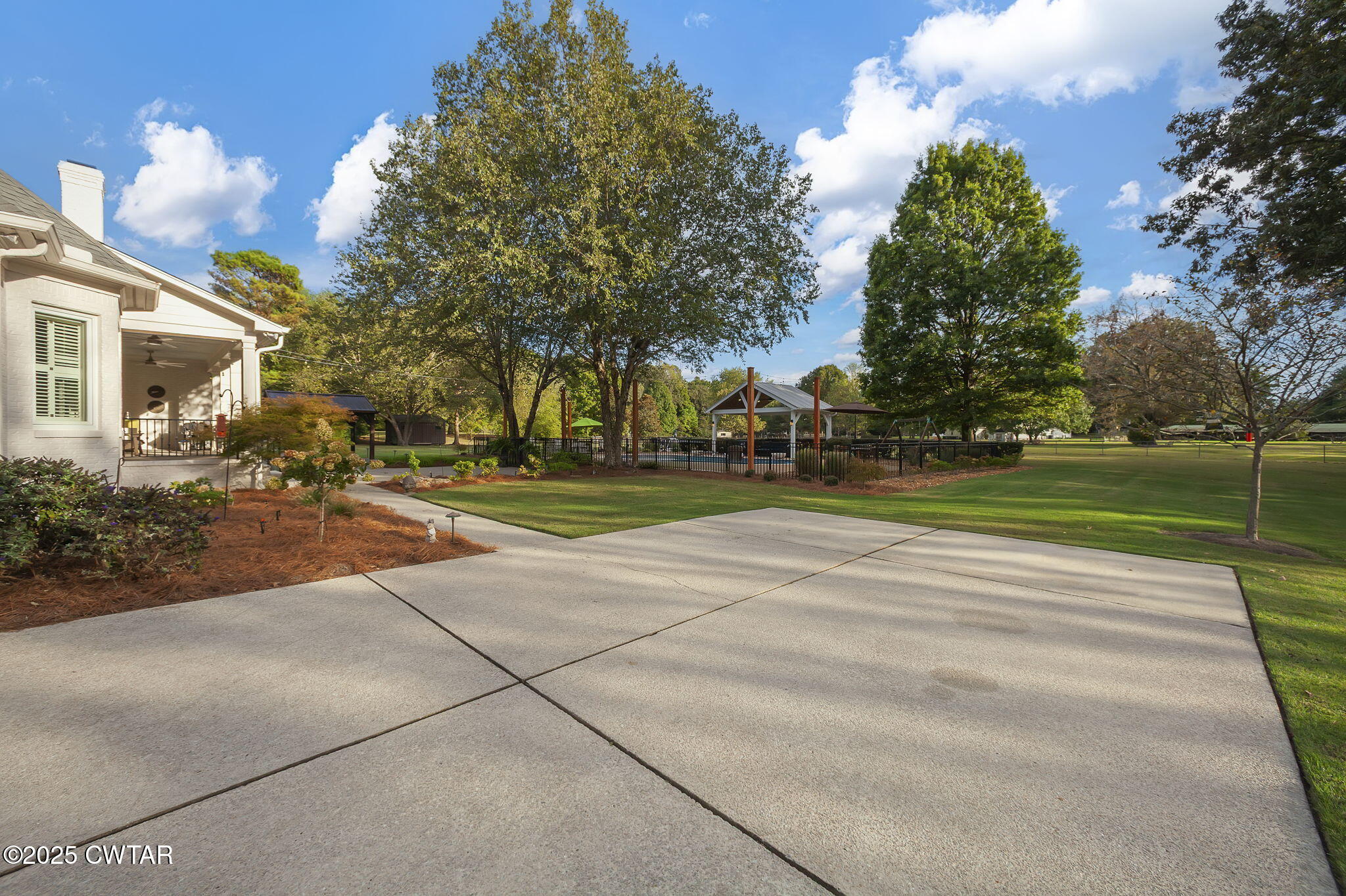 119 Bascom Road Jackson, TN 38305 - Photo 42 of 49 a view of a yard with plants and trees