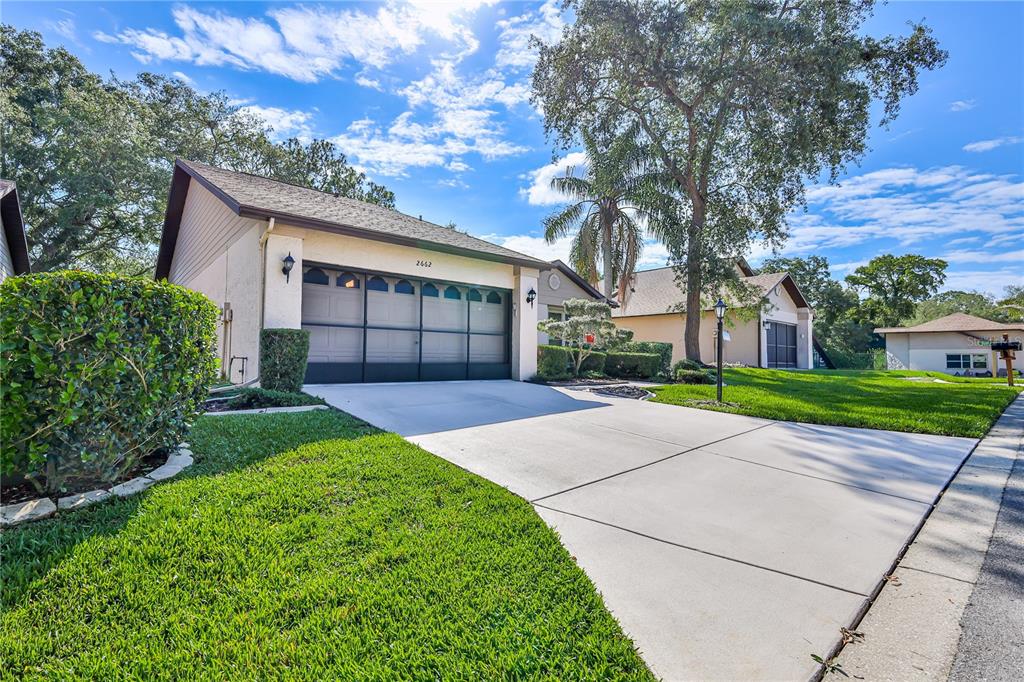 2662 Appleleaf Court Spring Hill, FL 34606 - Photo 4 of 47 a view of a house with a yard