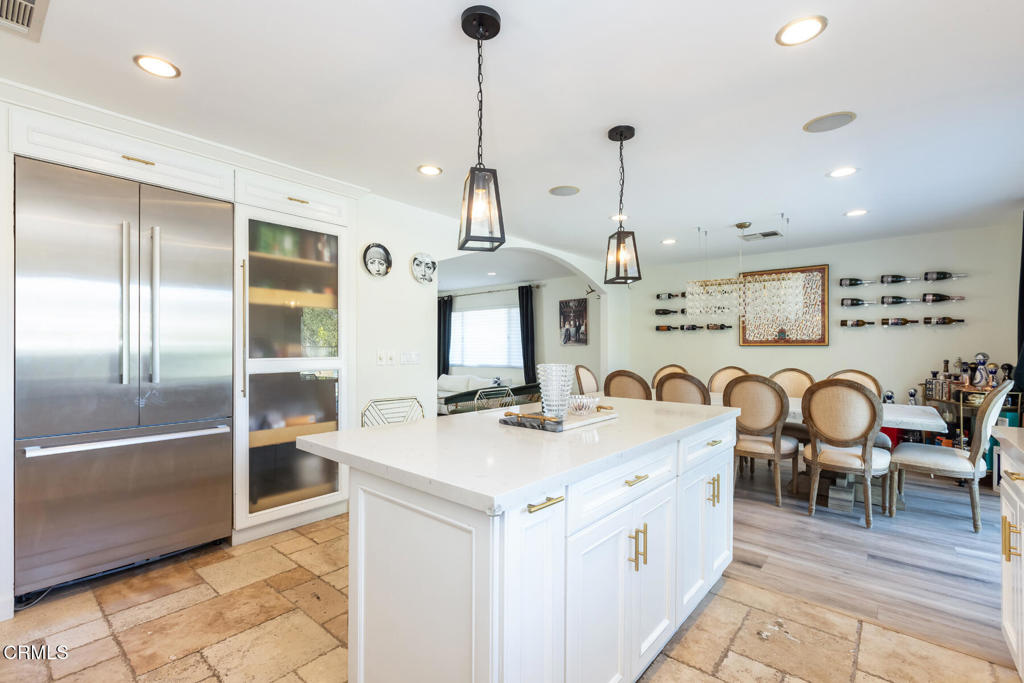 3623 St Elizabeth Road Glendale, CA 91206 - Photo 14 of 52 a kitchen with stainless steel appliances granite countertop a sink and a refrigerator
