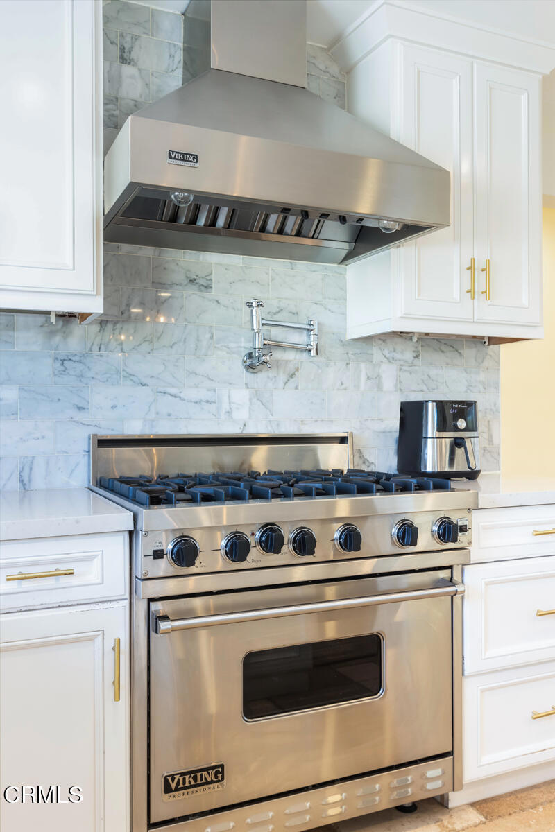 3623 St Elizabeth Road Glendale, CA 91206 - Photo 21 of 52 a stove top oven sitting inside of a kitchen