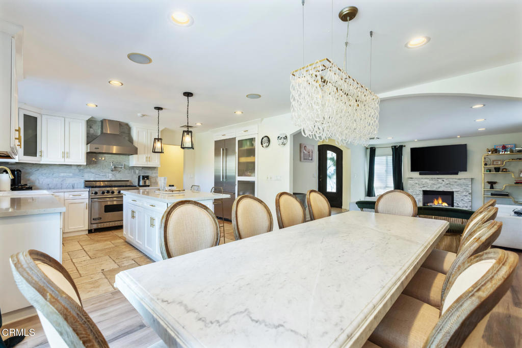 3623 St Elizabeth Road Glendale, CA 91206 - Photo 23 of 52 a large kitchen with sink a refrigerator and chairs