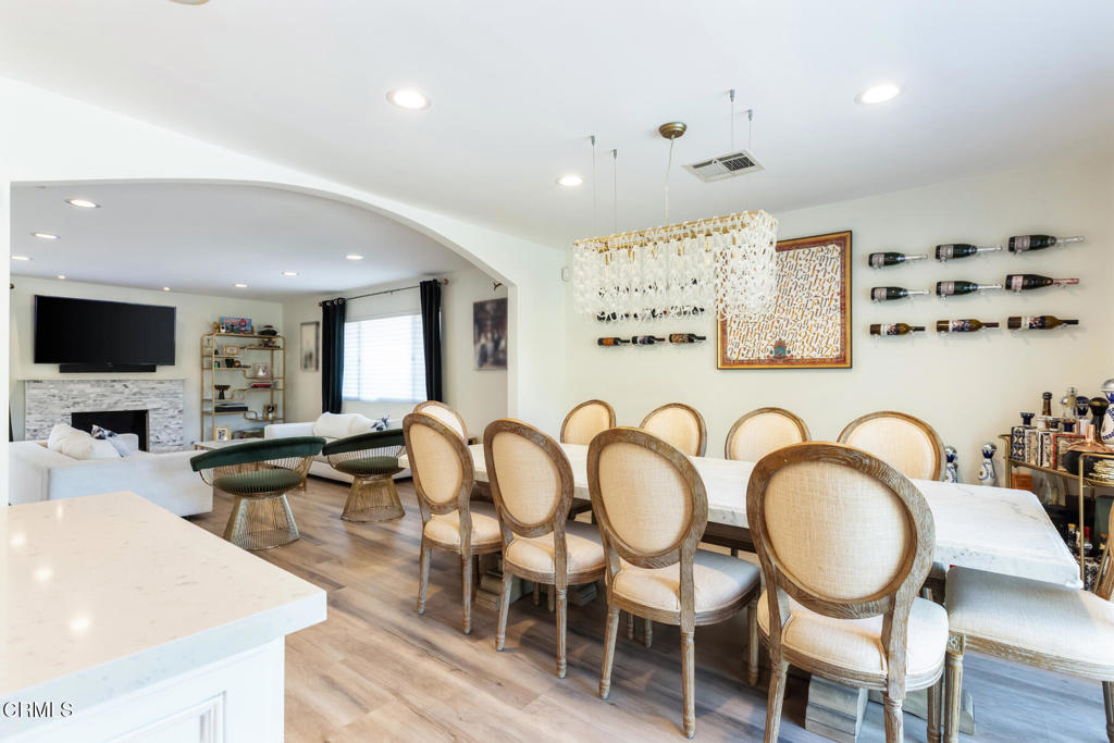 3623 St Elizabeth Road Glendale, CA 91206 - Photo 25 of 52 a living room with furniture a flat screen tv and kitchen view