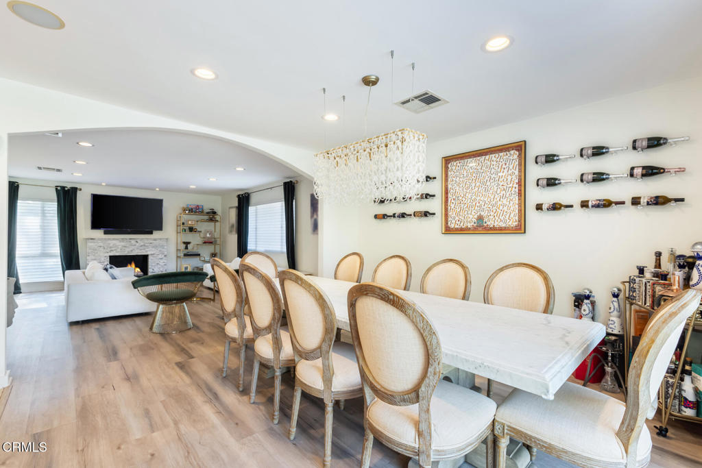 3623 St Elizabeth Road Glendale, CA 91206 - Photo 26 of 52 a living room with furniture a flat screen tv and kitchen view