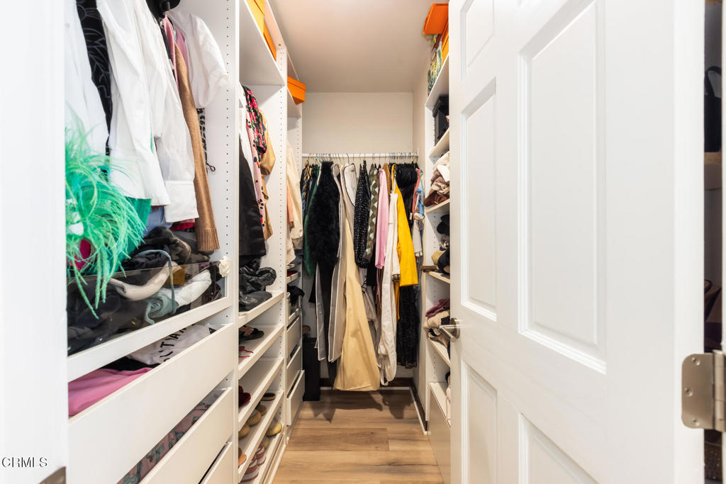 3623 St Elizabeth Road Glendale, CA 91206 - Photo 33 of 52 a view of walk in closet with clothes and shoes