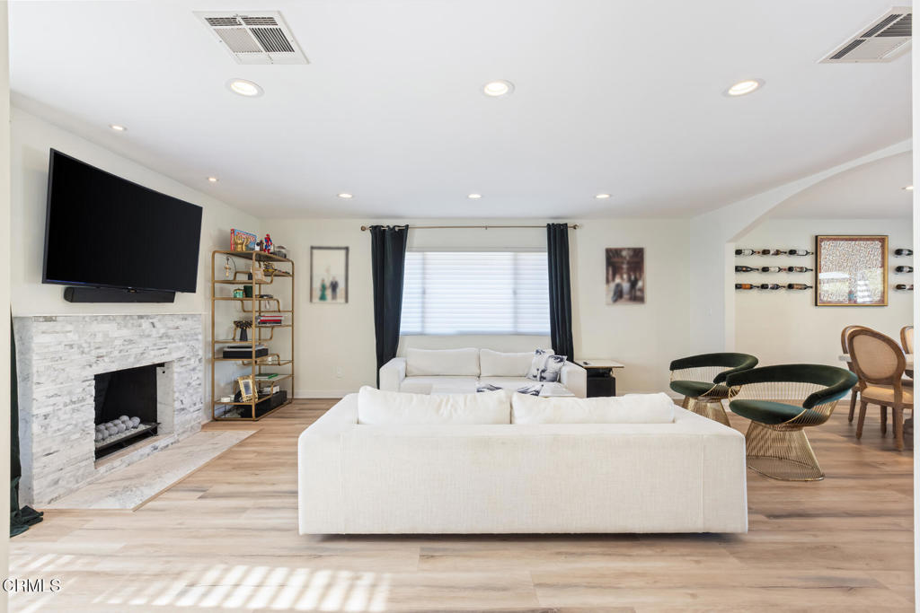 3623 St Elizabeth Road Glendale, CA 91206 - Photo 6 of 52 a living room with furniture and a flat screen tv