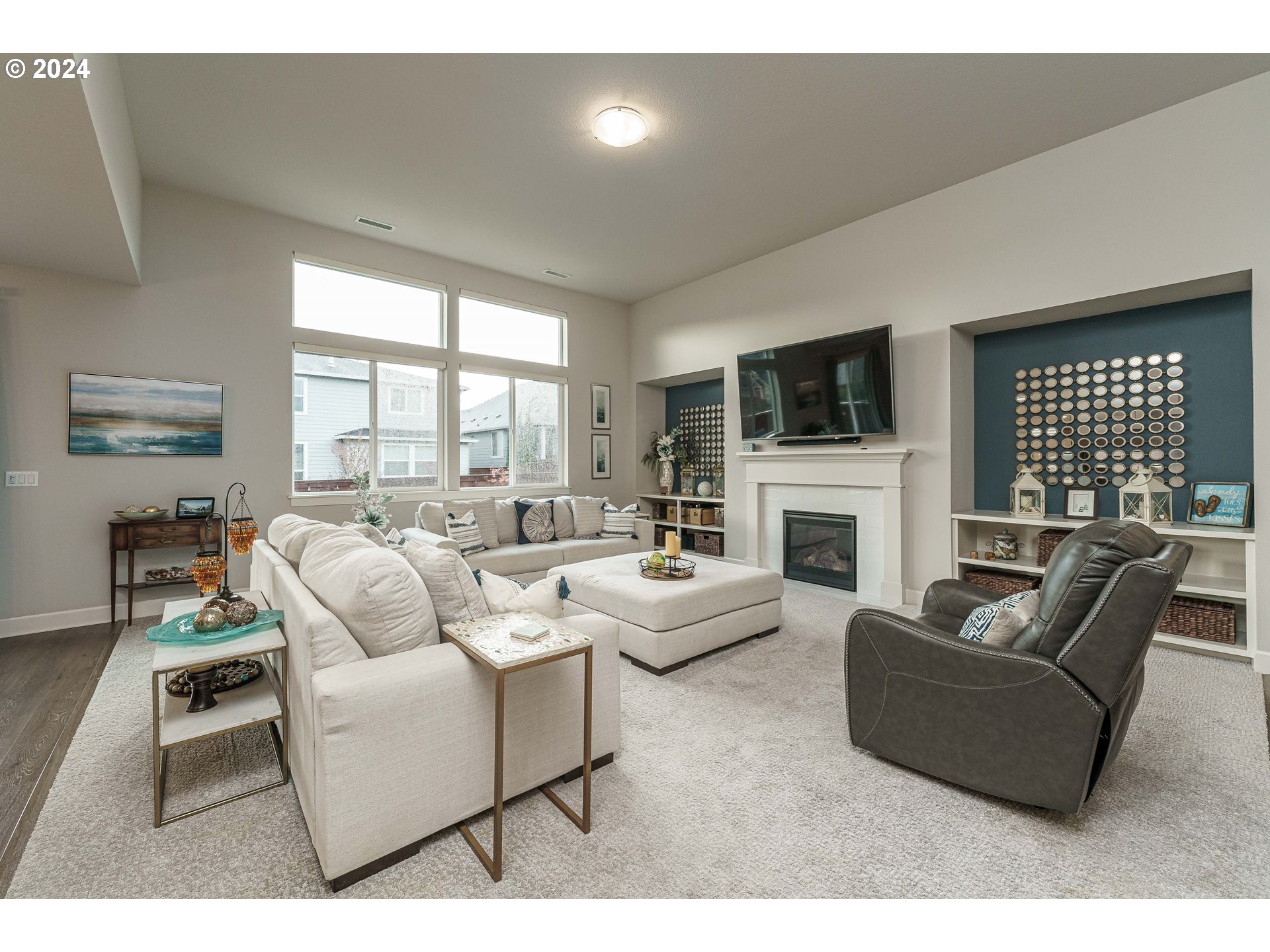 1839 South 47th Place Ridgefield, WA 98642 - Photo 16 of 40 a living room with fireplace furniture and a flat screen tv