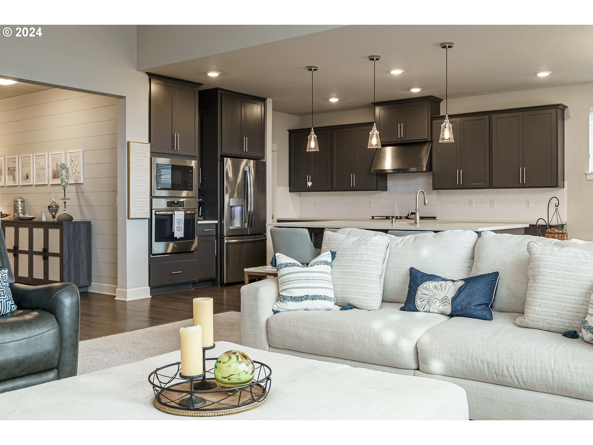 1839 South 47th Place Ridgefield, WA 98642 - Photo 20 of 40 a living room with stainless steel appliances furniture and a view of kitchen