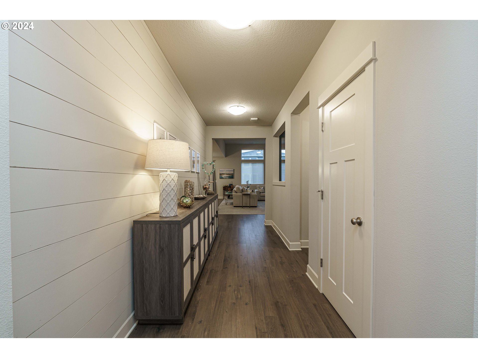 1839 South 47th Place Ridgefield, WA 98642 - Photo 2 of 40 a view of a hallway with wooden floor