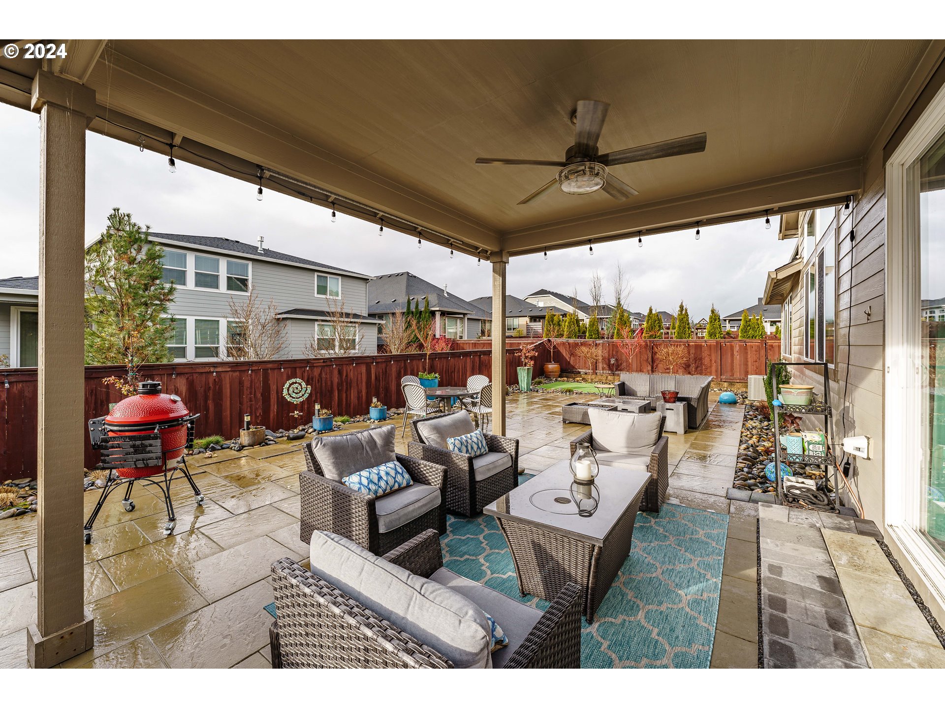 1839 South 47th Place Ridgefield, WA 98642 - Photo 32 of 40 a view of a chairs and table in patio with a balcony