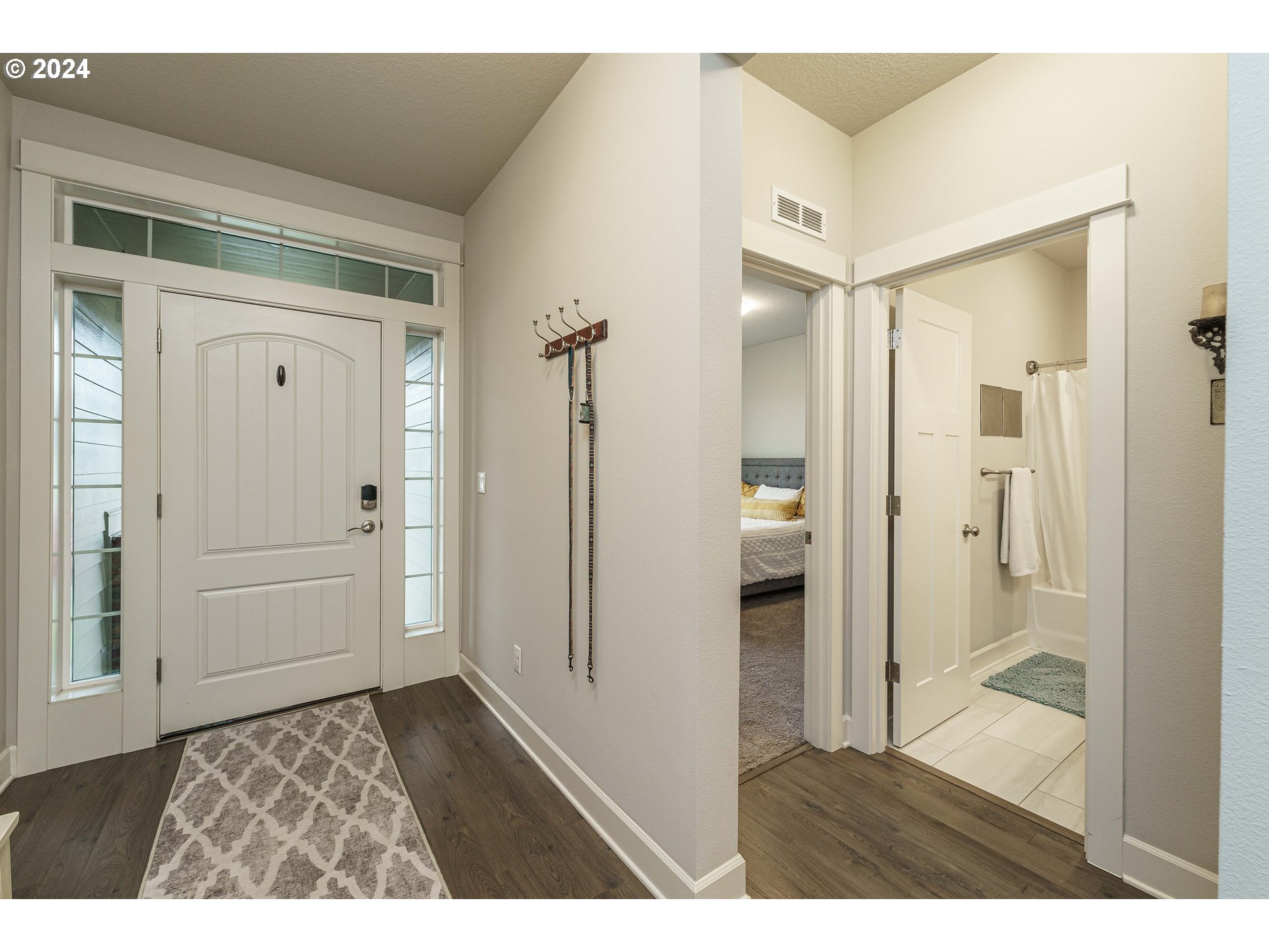 1839 South 47th Place Ridgefield, WA 98642 - Photo 4 of 40 a bathroom with a shower and a sink
