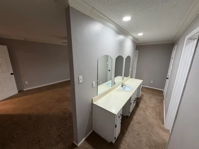 a bathroom with a toilet and a sink