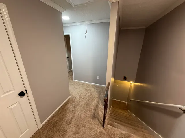 a view of empty room with windows