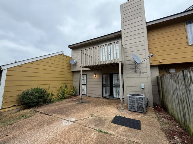 a view of a street with an outdoor space