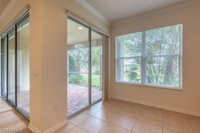 8887 Ravello Court Naples, FL 34114 - Photo 15 of 22 Entryway with ornamental molding and light tile patterned floors