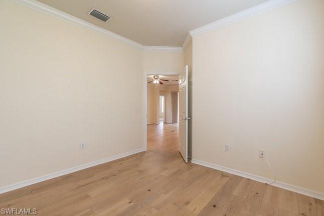 8887 Ravello Court Naples, FL 34114 - Photo 18 of 22 Spare room with ornamental molding, light wood-type flooring, and ceiling fan