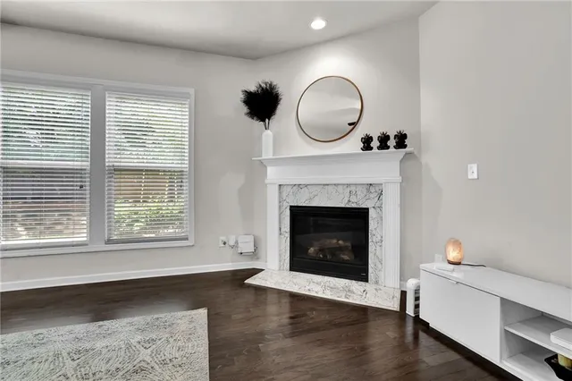 a view of entryway with wooden floor and a potted plant