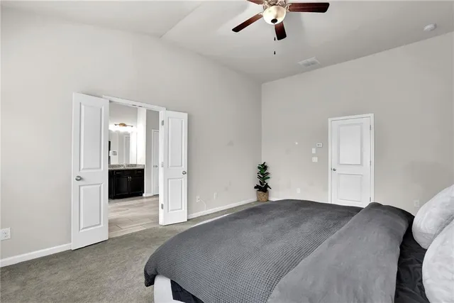 a bathroom with a sink a vanity and a mirror