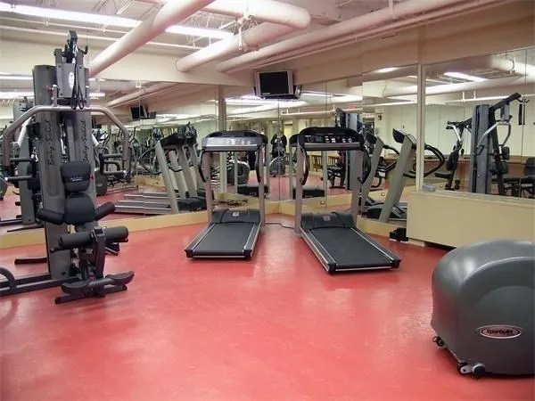 a gym room with gym equipment