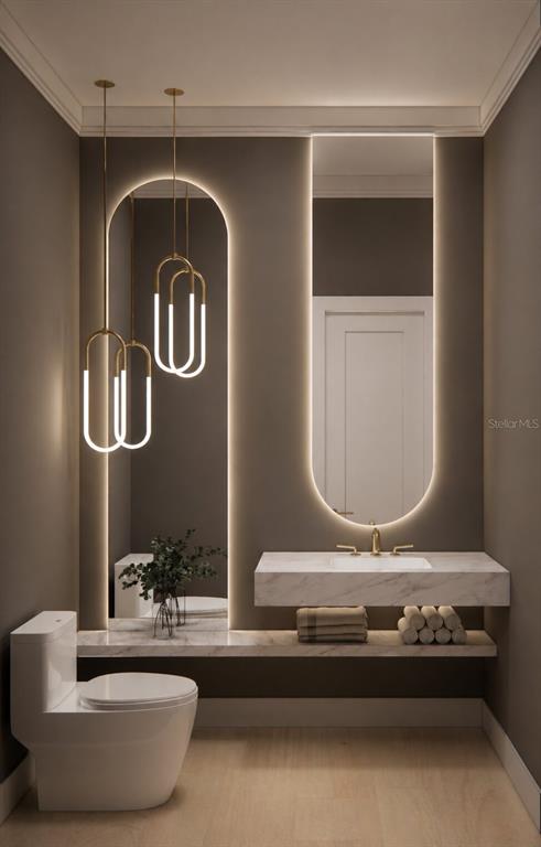 2501 Cole Road Orlando, FL 32803 - Photo 5 of 14 a bathroom with a sink and a mirror