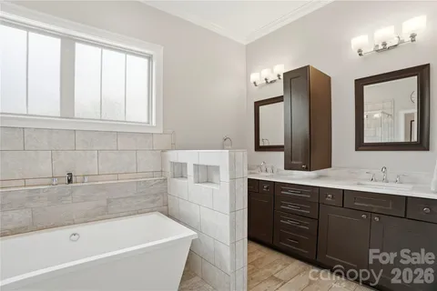 a bathroom with a bathtub and a toilet