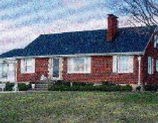 1951 Mill Iron Road Goodview, VA 24095 - Photo 1 of 1 a view of a house with a garden