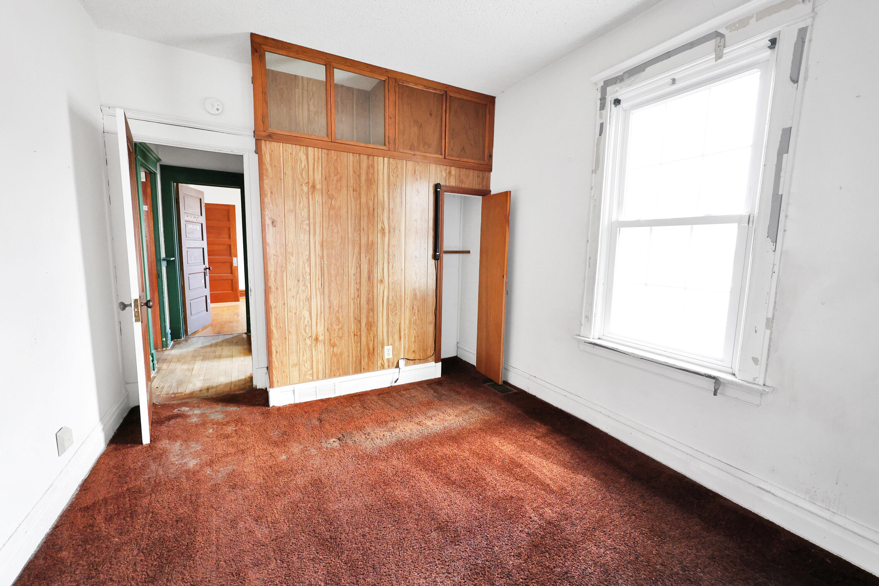 112 South Indiana Street Hobart, IN 46342 - Photo 12 of 25 a view of an empty room with a window