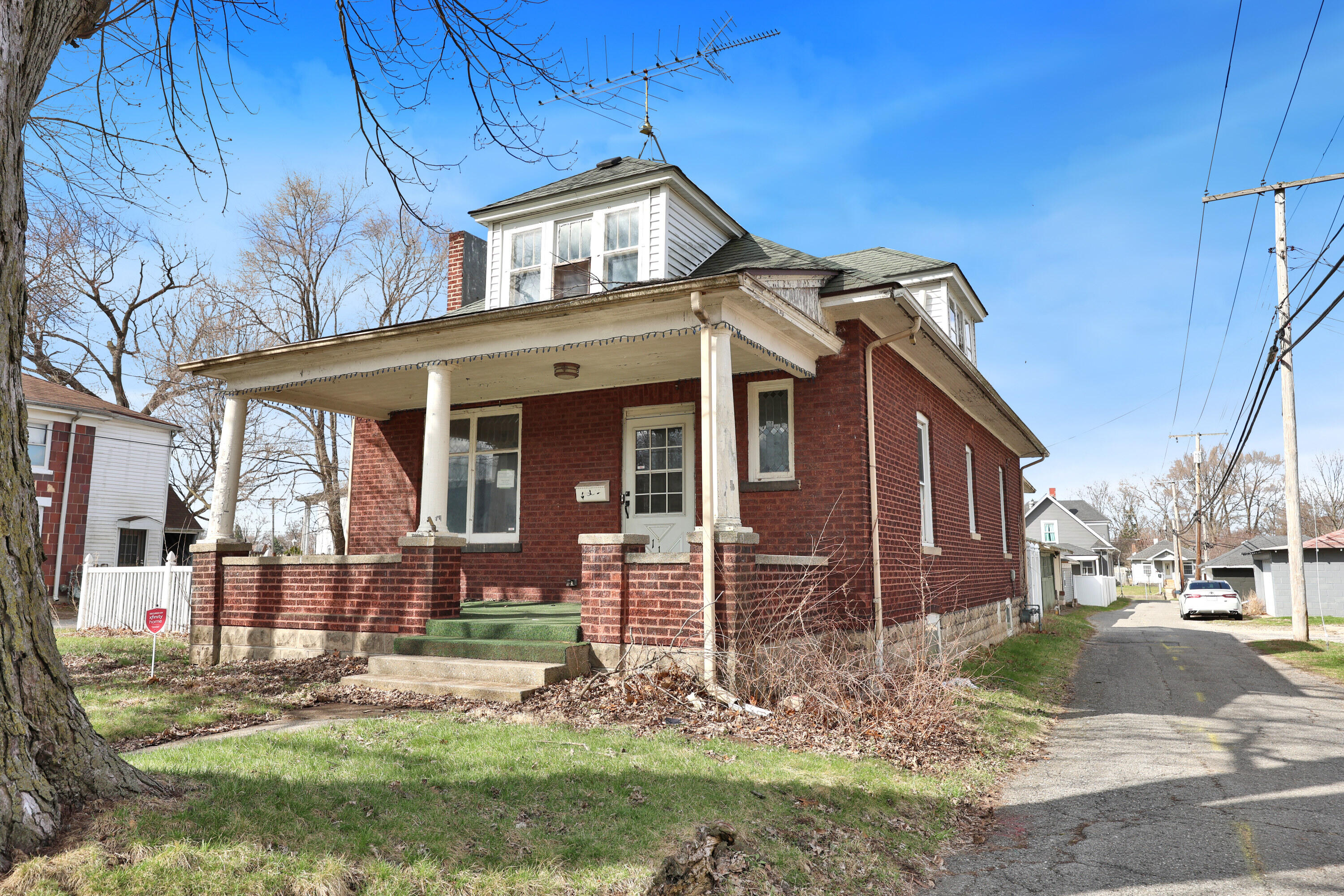 112 South Indiana Street Hobart, IN 46342 - Photo 2 of 25 a front view of a house with garden
