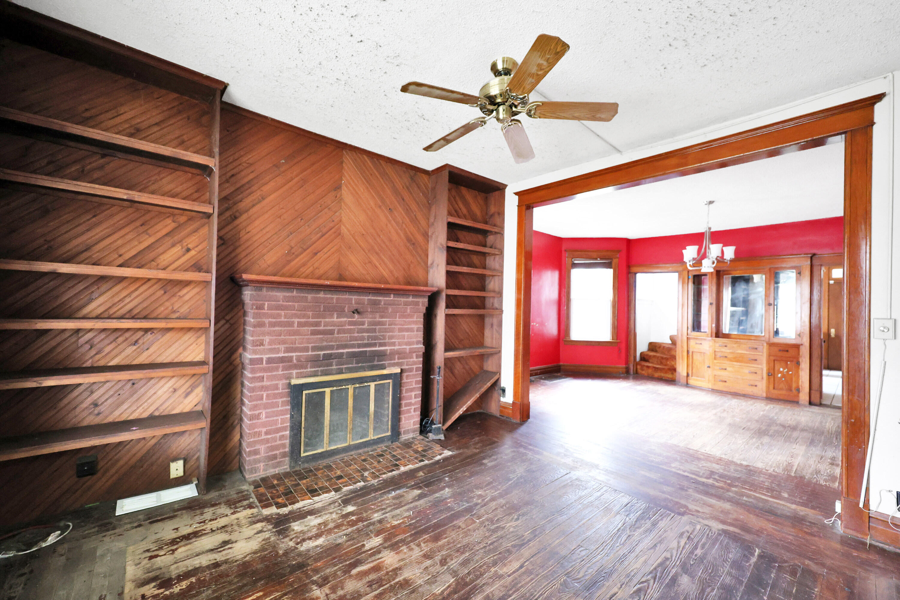 112 South Indiana Street Hobart, IN 46342 - Photo 8 of 25 a view of a livingroom with a ceiling fan and window