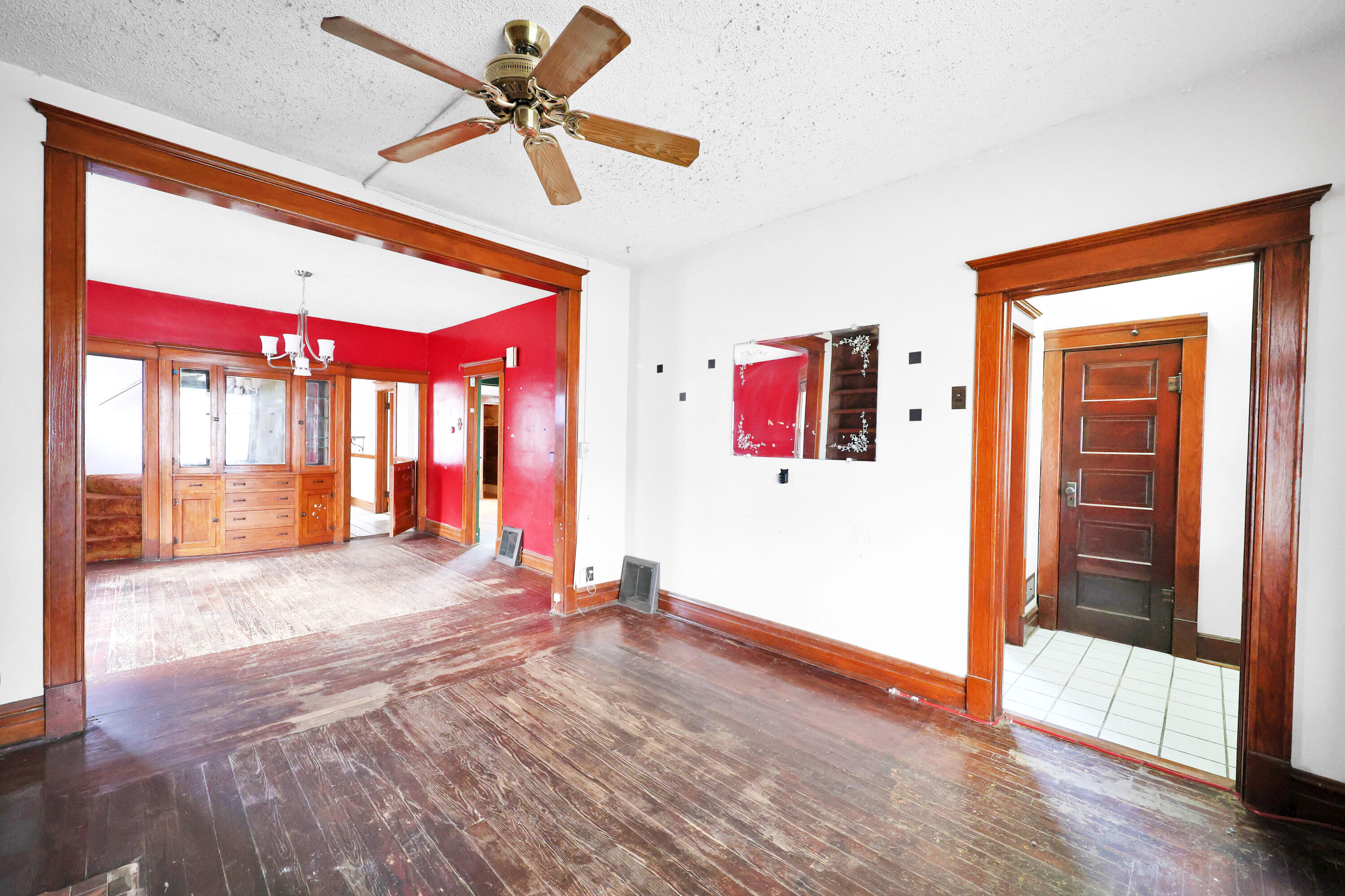 112 South Indiana Street Hobart, IN 46342 - Photo 9 of 25 a view of an empty room with a window and a ceiling fan