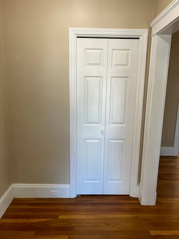 a view of room with hardwood floor