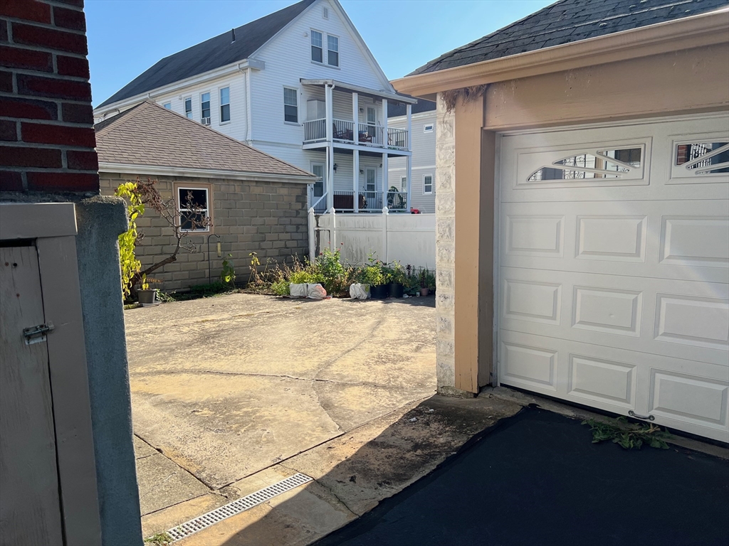 84 Melrose Street, Unit 1 Arlington, MA 02474 - Photo 4 of 42 a view of backyard of house
