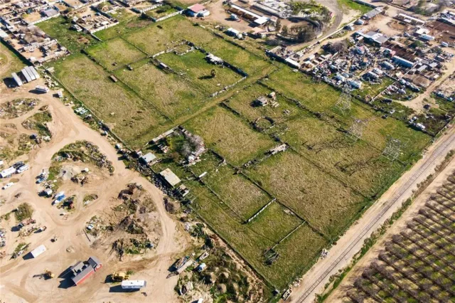 an aerial view of residential building and ocean view