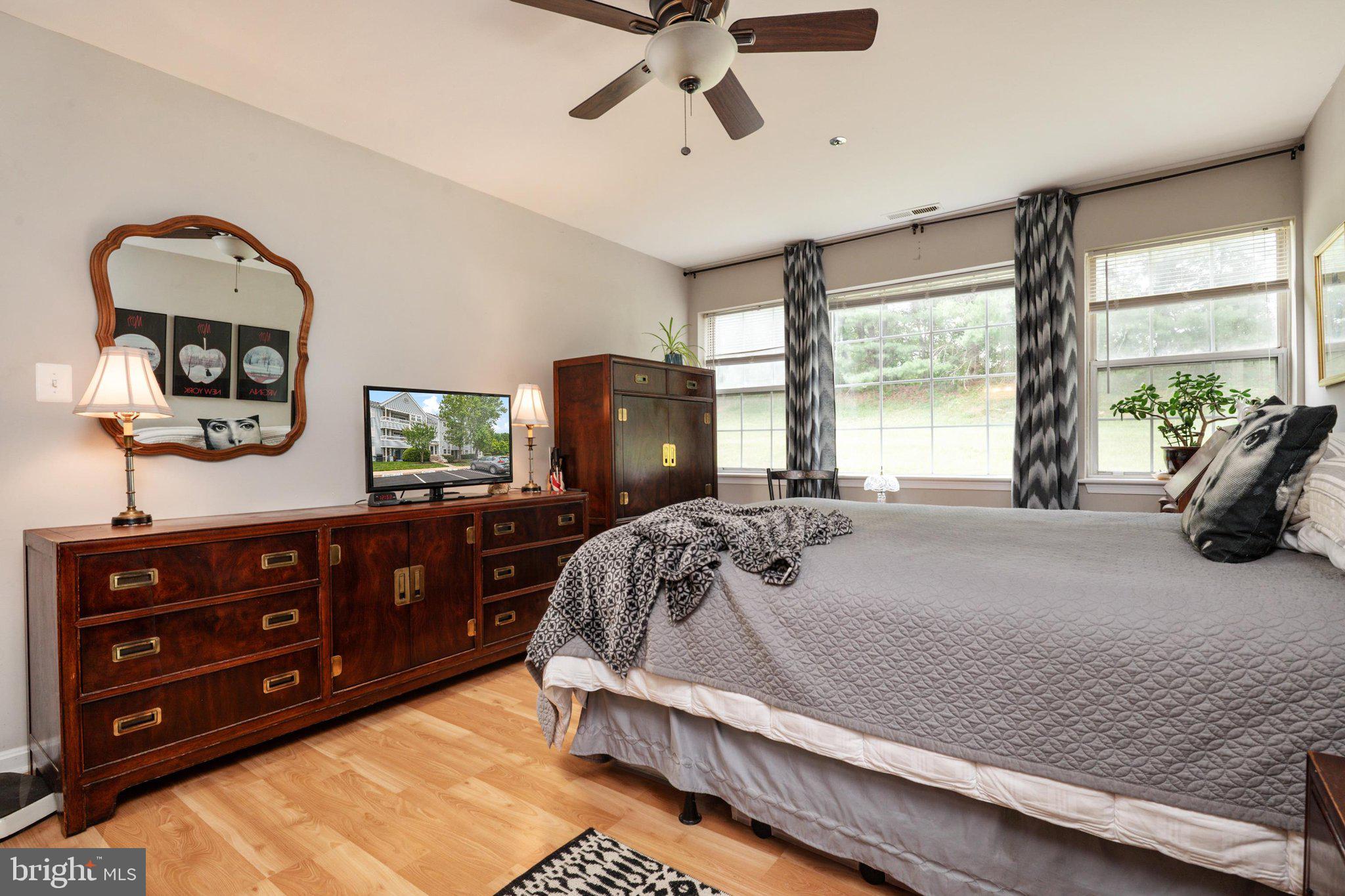 8337 Montgomery Run Road, Unit C Ellicott City, MD 21043 - Photo 15 of 24 Owner's Bedroom with view of woods