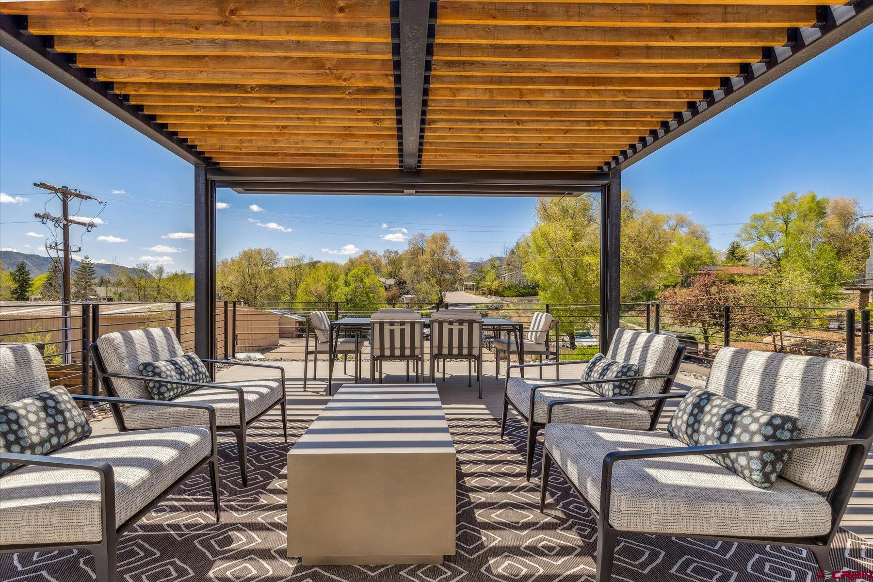73 Jameson Drive Durango, CO 81301 - Photo 2 of 43 a view of a patio with couches chairs dining table and chairs