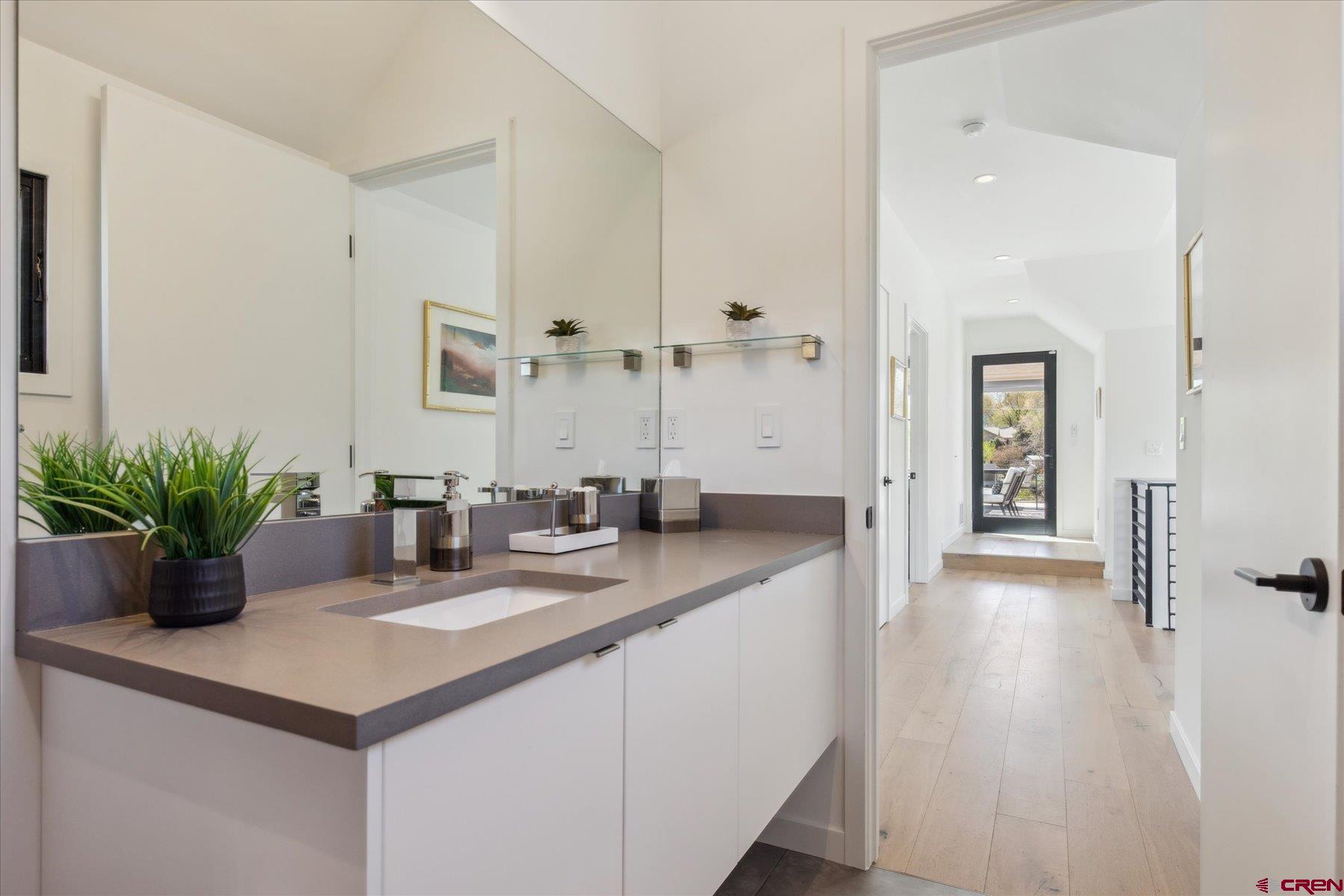 73 Jameson Drive Durango, CO 81301 - Photo 28 of 43 a bathroom with sink and mirror