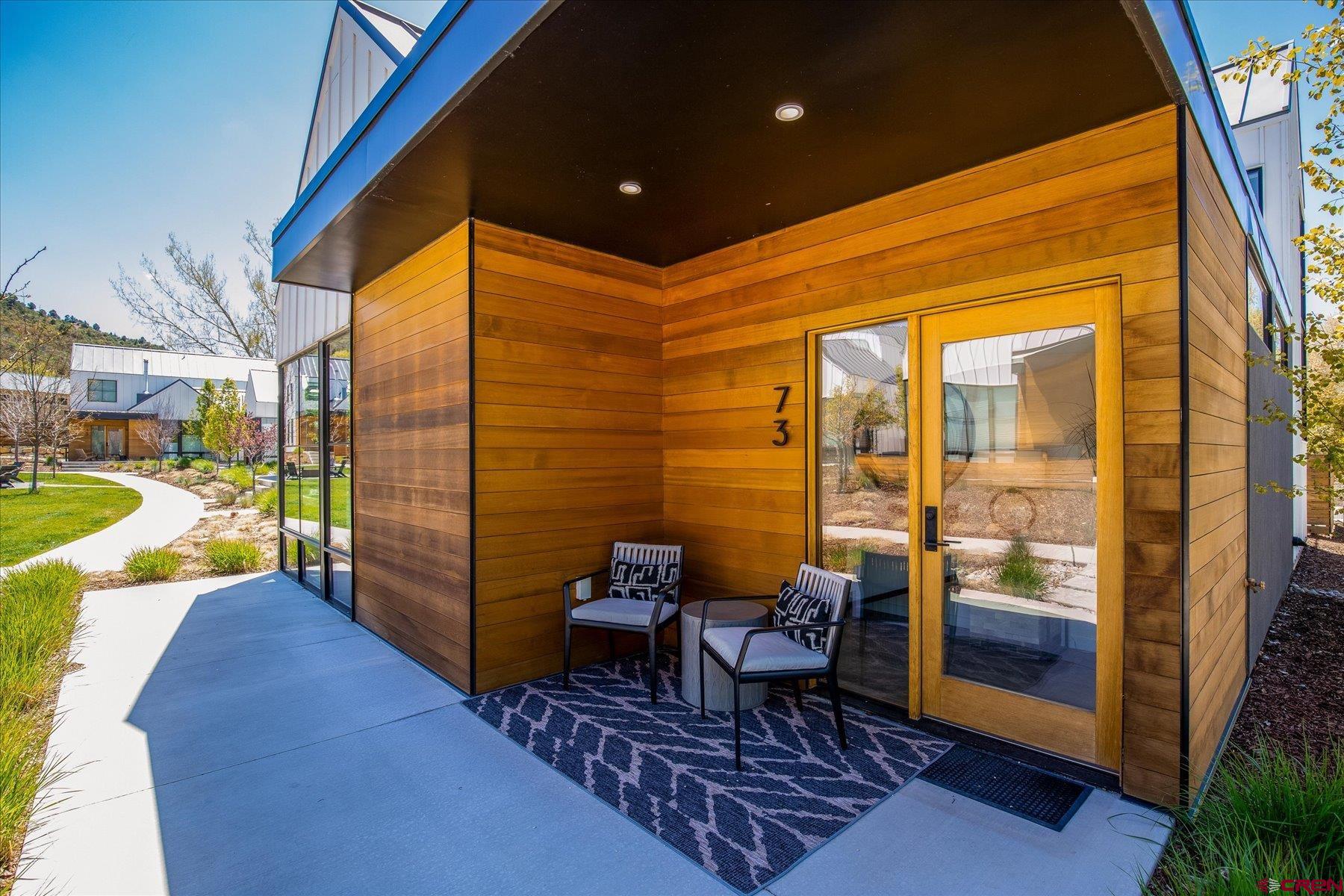 73 Jameson Drive Durango, CO 81301 - Photo 35 of 43 a balcony with chairs and table