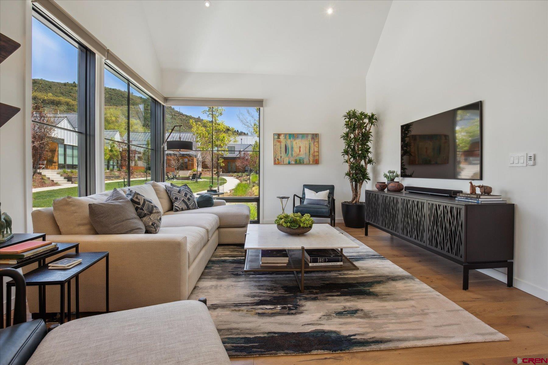 73 Jameson Drive Durango, CO 81301 - Photo 4 of 43 a living room with furniture and a flat screen tv