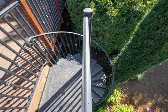 a view of balcony with wooden floor and outdoor space