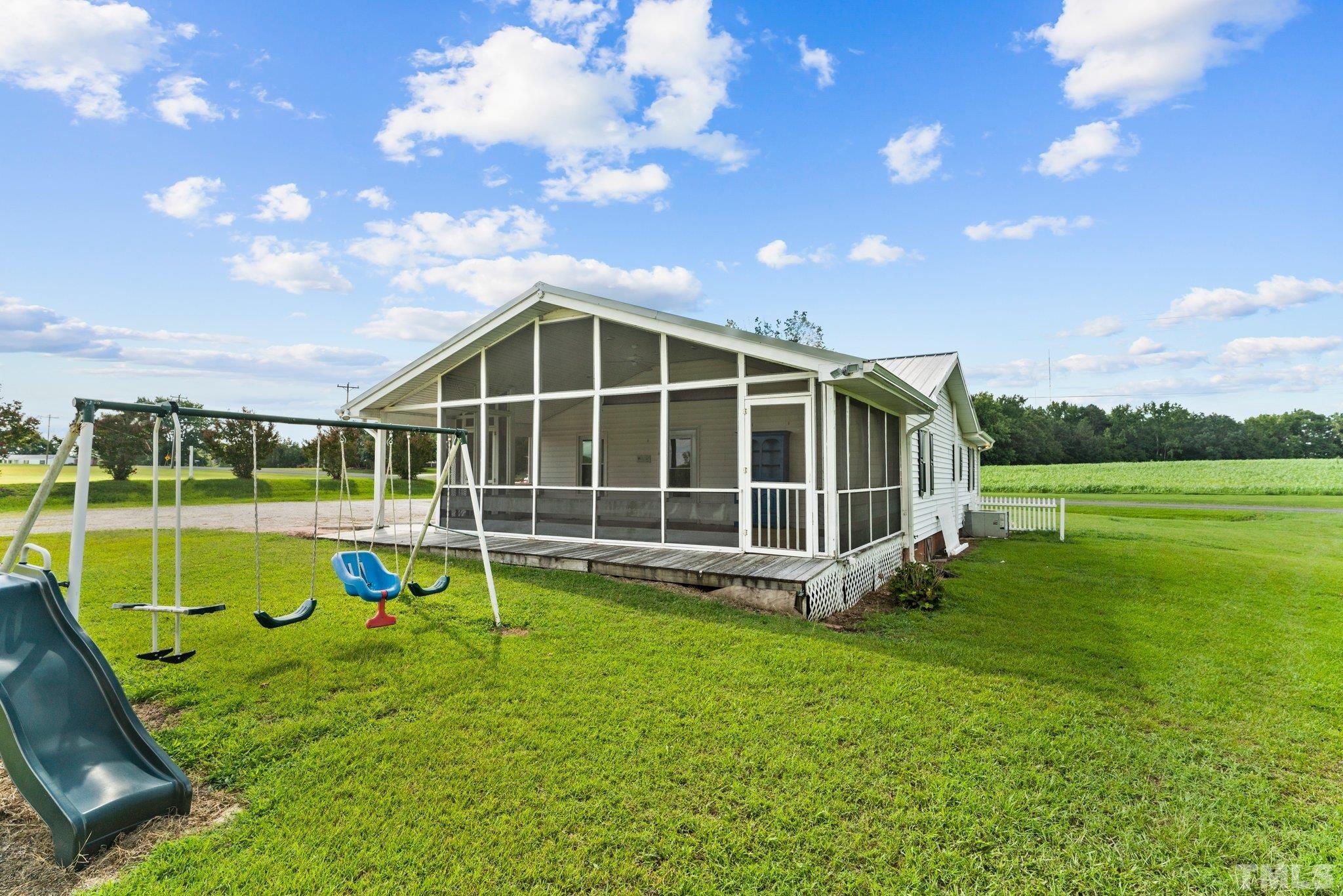2929 Wall Store Road Garner, NC 27529 - Photo 30 of 59 a view of a house with backyard
