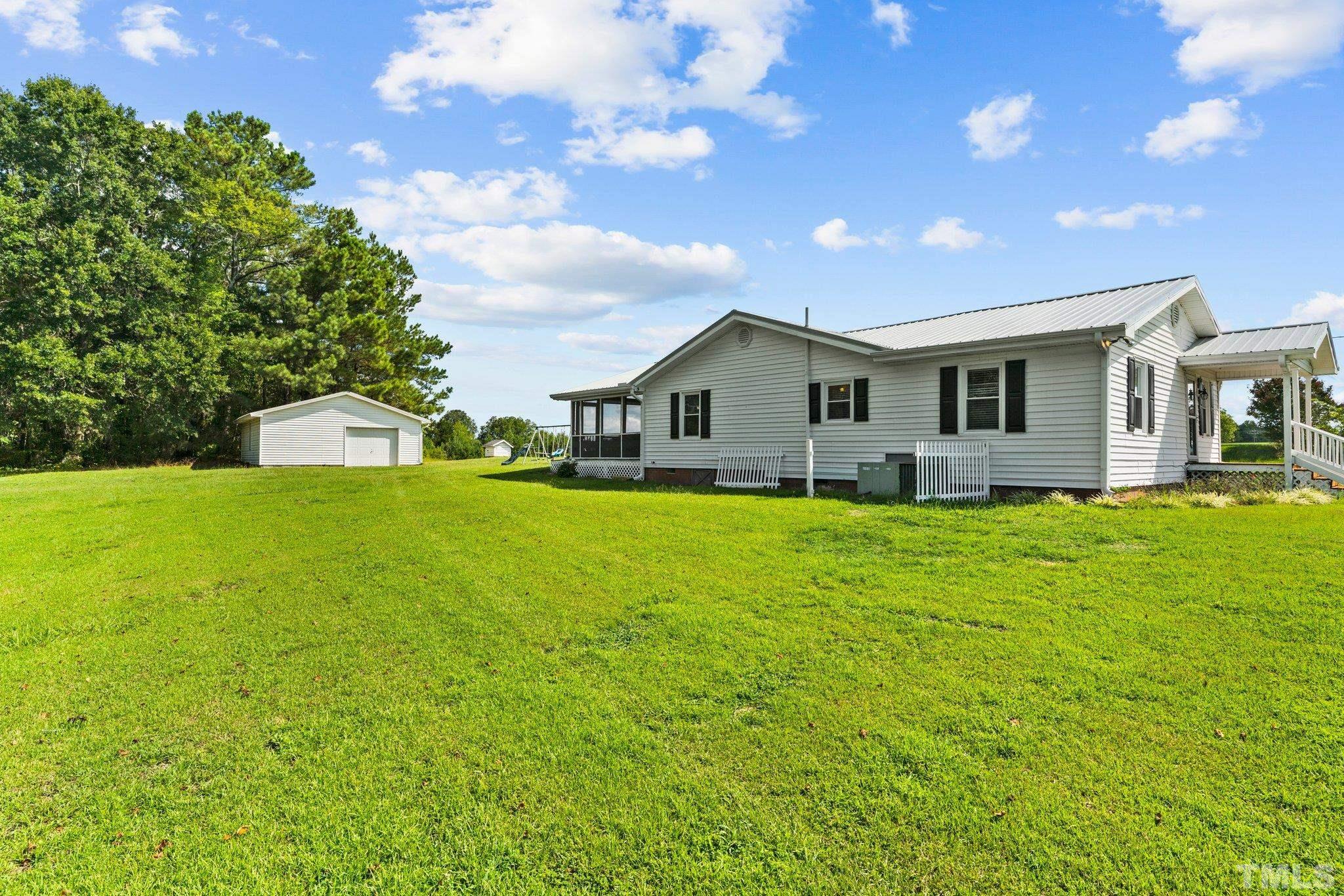 2929 Wall Store Road Garner, NC 27529 - Photo 37 of 59 a view of a house with a yard