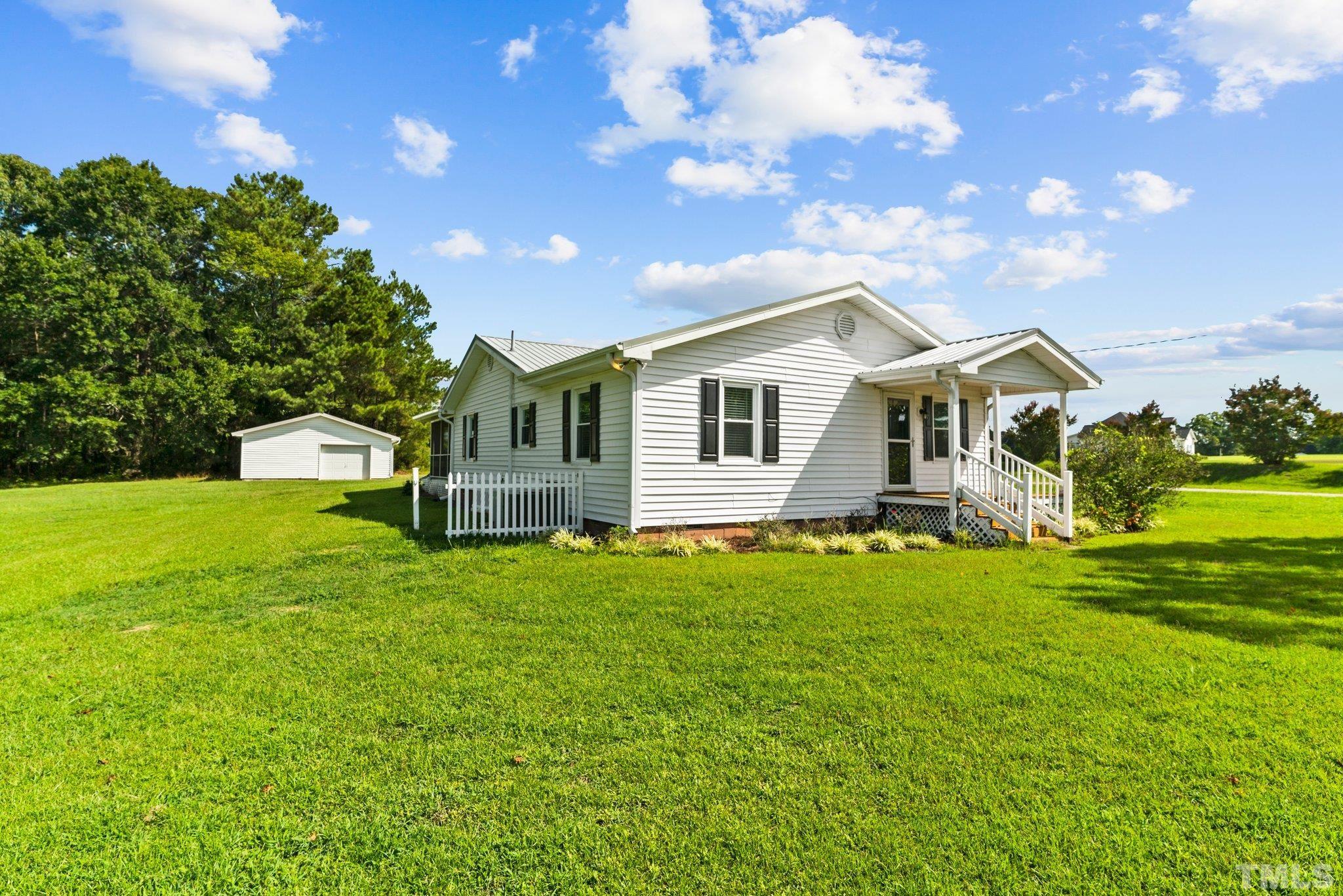 2929 Wall Store Road Garner, NC 27529 - Photo 38 of 59 a front view of a house with a yard
