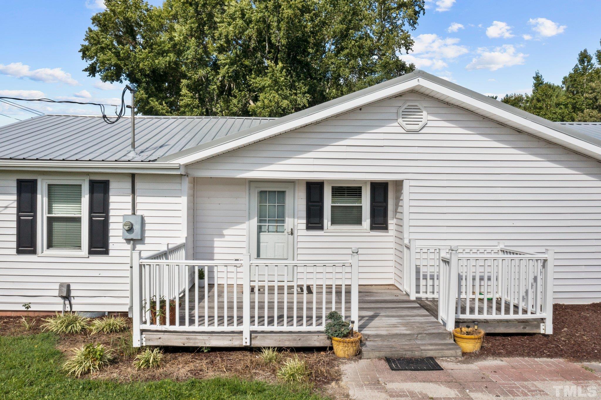 2929 Wall Store Road Garner, NC 27529 - Photo 39 of 59 a view of a house with a yard