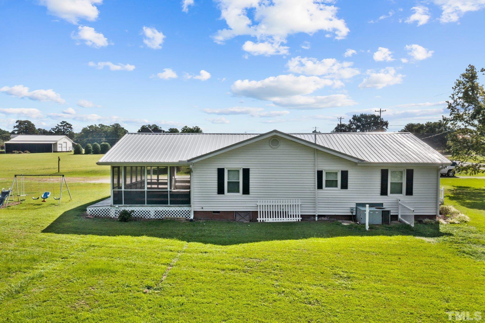 2929 Wall Store Road Garner, NC 27529 - Photo 44 of 59 a front view of house with yard and porch