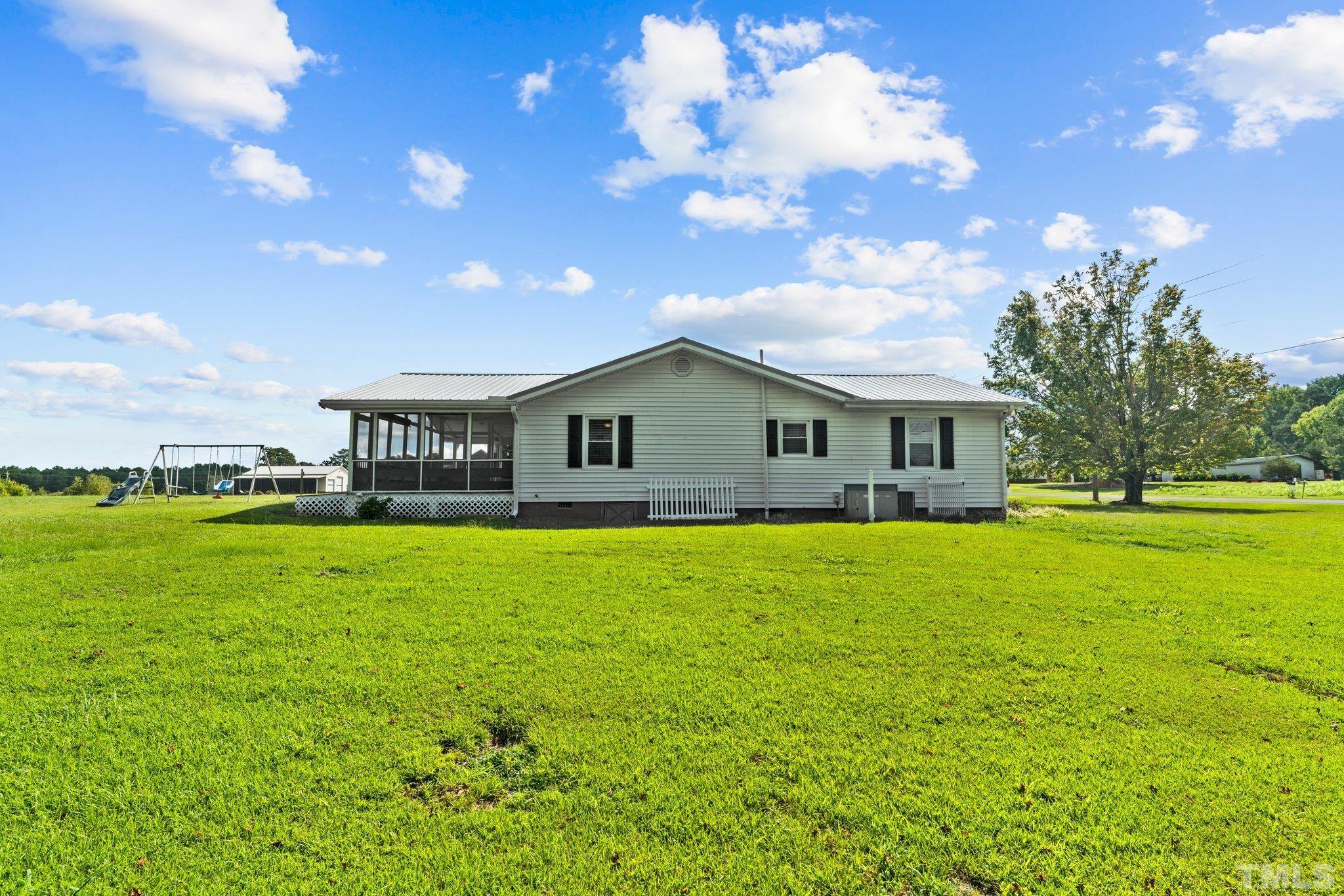2929 Wall Store Road Garner, NC 27529 - Photo 45 of 59 a front view of house with yard and green space